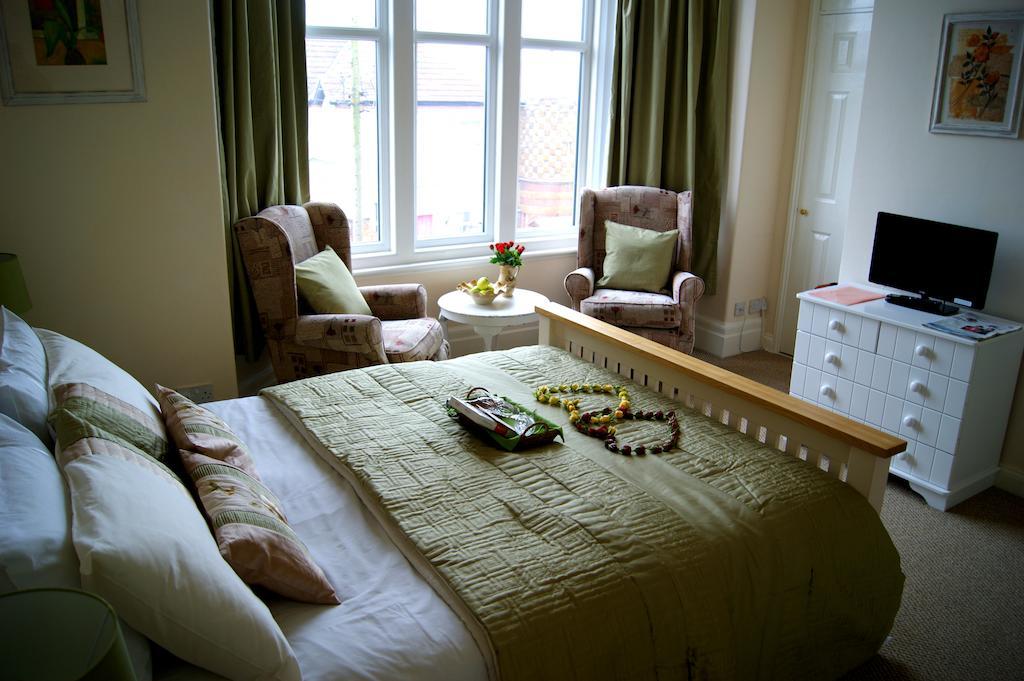 Sunset Guest House Hunstanton Ruang foto A bedroom at the care home