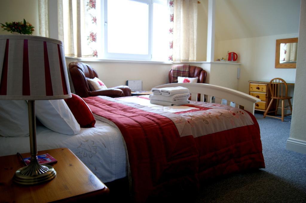 Sunset Guest House Hunstanton Ruang foto A bedroom at the hostel